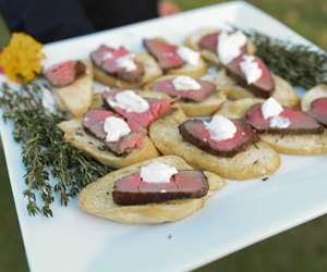 beef tenderloin appetizers on a catering tray